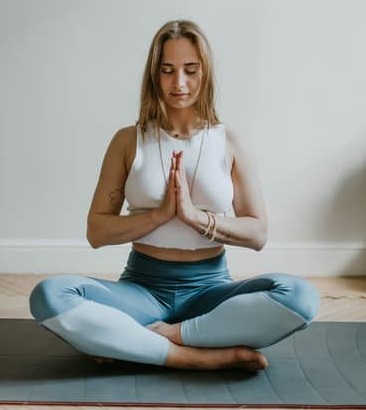 Lady sitting in meditation