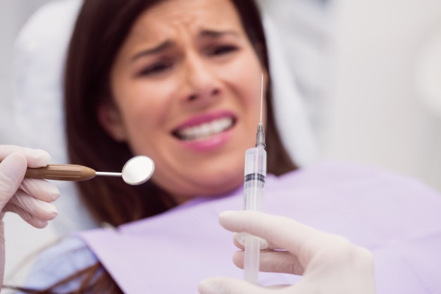 Dentist with Patient 